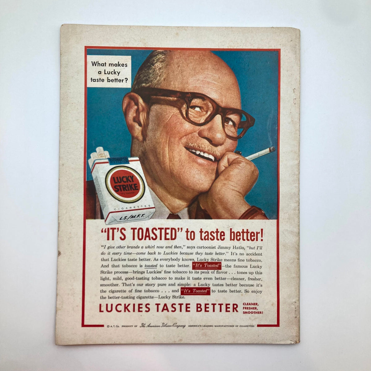 Back cover of VTG Everywoman's Magazine August 1954 featuring an advertisement for Lucky Strike cigarettes, highlighting their toasting process for enhanced flavor.