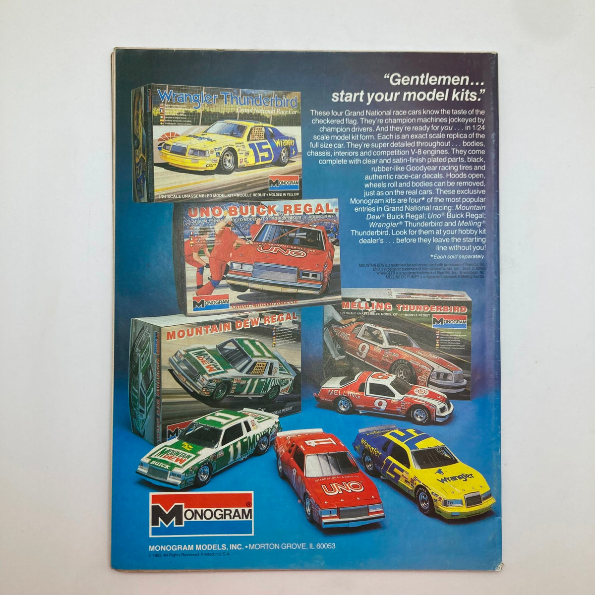 Back cover of VTG Stock Car Racing Magazine November 1983 featuring model kits of iconic stock cars including Wrangler Thunderbird, Uno Buick Regal, Mountain Dew Regal, and Welling Thunderbird from Monogram. Perfect representation of racing memorabilia.