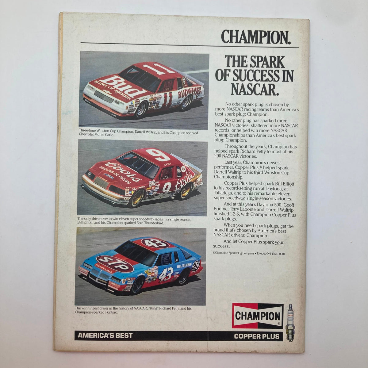 November 1986 issue of Stock Car Racing Magazine featuring a spotlight on the Oxford 250 Car Race. The image showcases three racing cars, including Darrell Waltrip's Chevrolet Monte Carlo and Bill Elliott's Ford Thunderbird, highlighting Champion spark plugs as a key factor in NASCAR success.