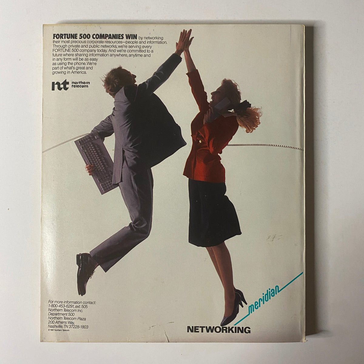 Fortune Magazine April 27, 1987, presenting an advertisement related to networking for Fortune 500 companies, representing corporate collaboration.