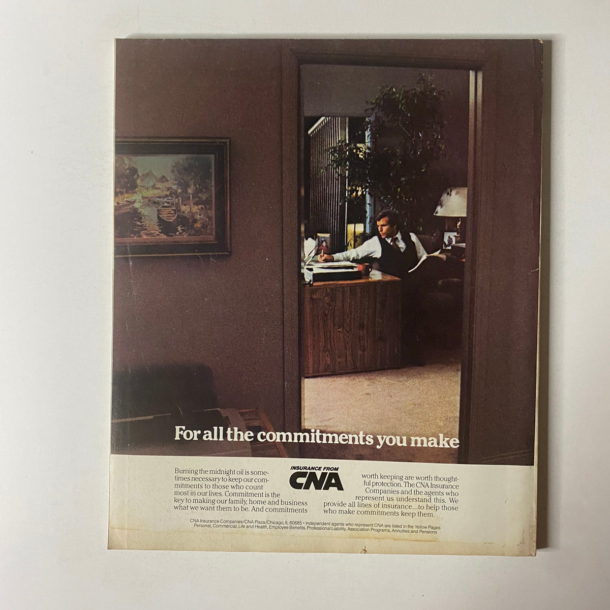 Back cover of Fortune Magazine dated October 31, 1983, displaying an advertisement for CNA Insurance with a businessman in an office setting, emphasizing commitment.