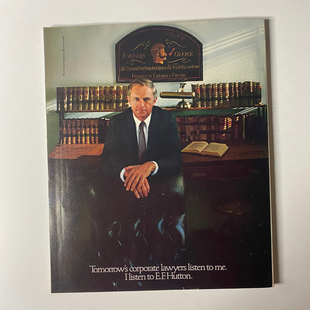 Back cover of Fortune Magazine October 17, 1983 featuring a corporate lawyer with the caption 'Tomorrow's corporate lawyers listen to me. I listen to E.F. Hutton.' The image illustrates the professional and authoritative theme prevalent in the corporate world during that era.