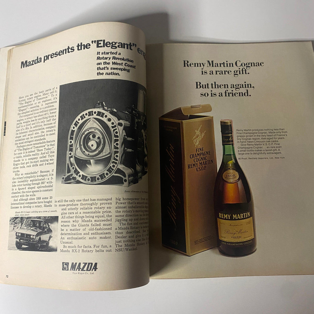 An interior page from Fortune Magazine December 1972 showcasing an advertisement for Mazda's 'Elegant' engine and Remy Martin Cognac, illustrating the marketing styles of the 1970s.