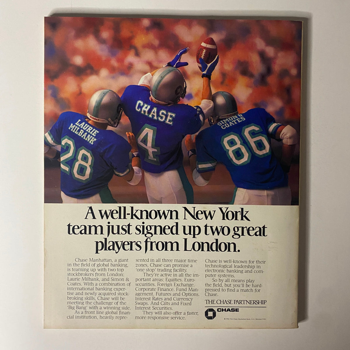 Back cover of Fortune Magazine June 9, 1986 showcasing an advertisement for Chase Manhattan Bank with football players, emphasizing the bank's strategic partnerships.