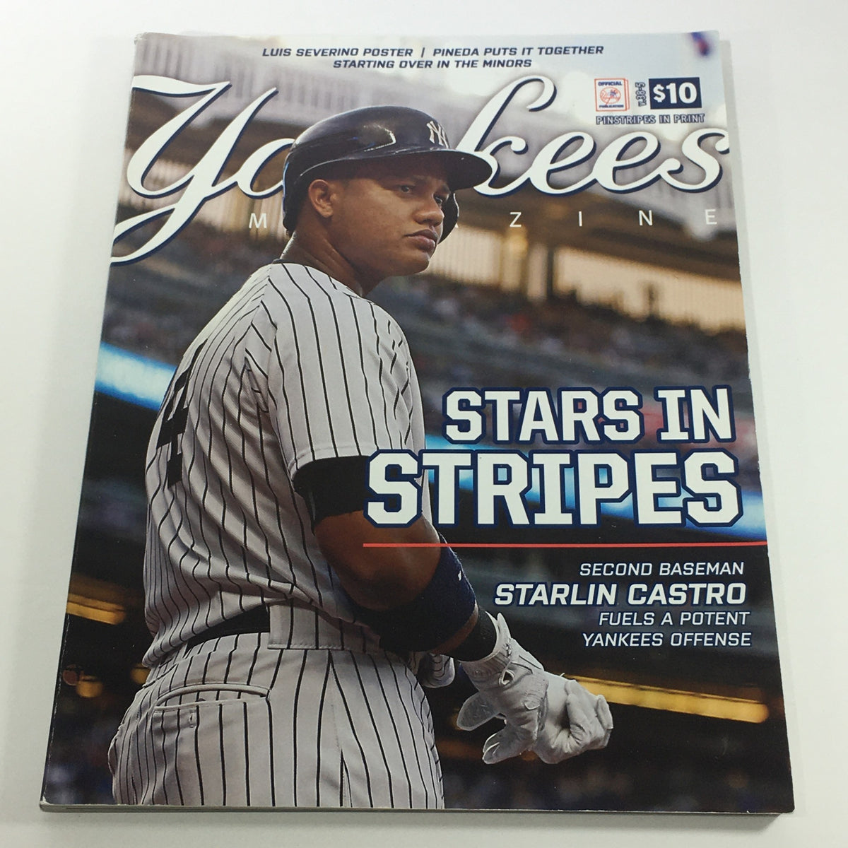 Cover of Yankees Magazine: July 2017 Volume 38-5 featuring Starlin Castro, highlighting his role as a second baseman and key player in the Yankees offense, with the title 'Stars In Stripes'.