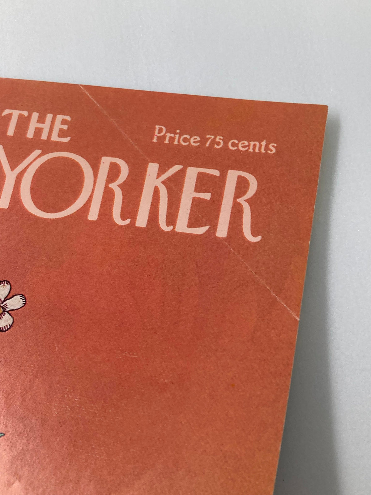 Close-up of The New Yorker April 4 1977 cover titled A Flower by Robert Tallon, featuring the magazine title and a price tag of 75 cents.