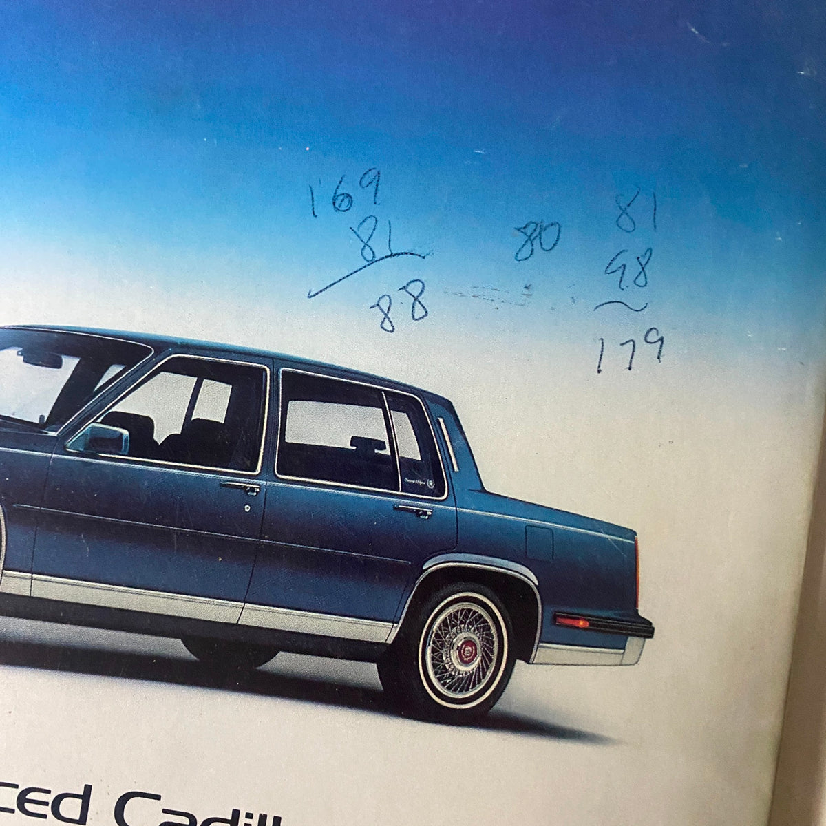 Close-up of the 1985 Cadillac Fleetwood advertisement from the April 1, 1985 Fortune Magazine, displaying the car's design and promotional tagline about luxury and technology.