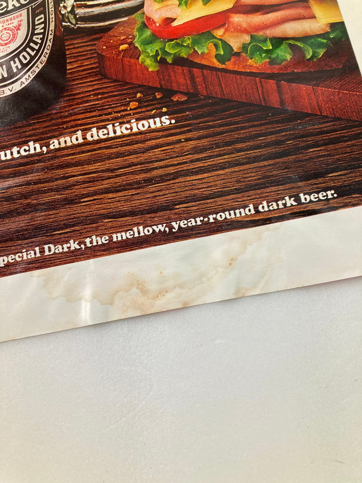 The New Yorker cover dated July 21, 1980, highlighting the top portion of the cover with a water-damaged area and text featuring a dark beer advertisement.