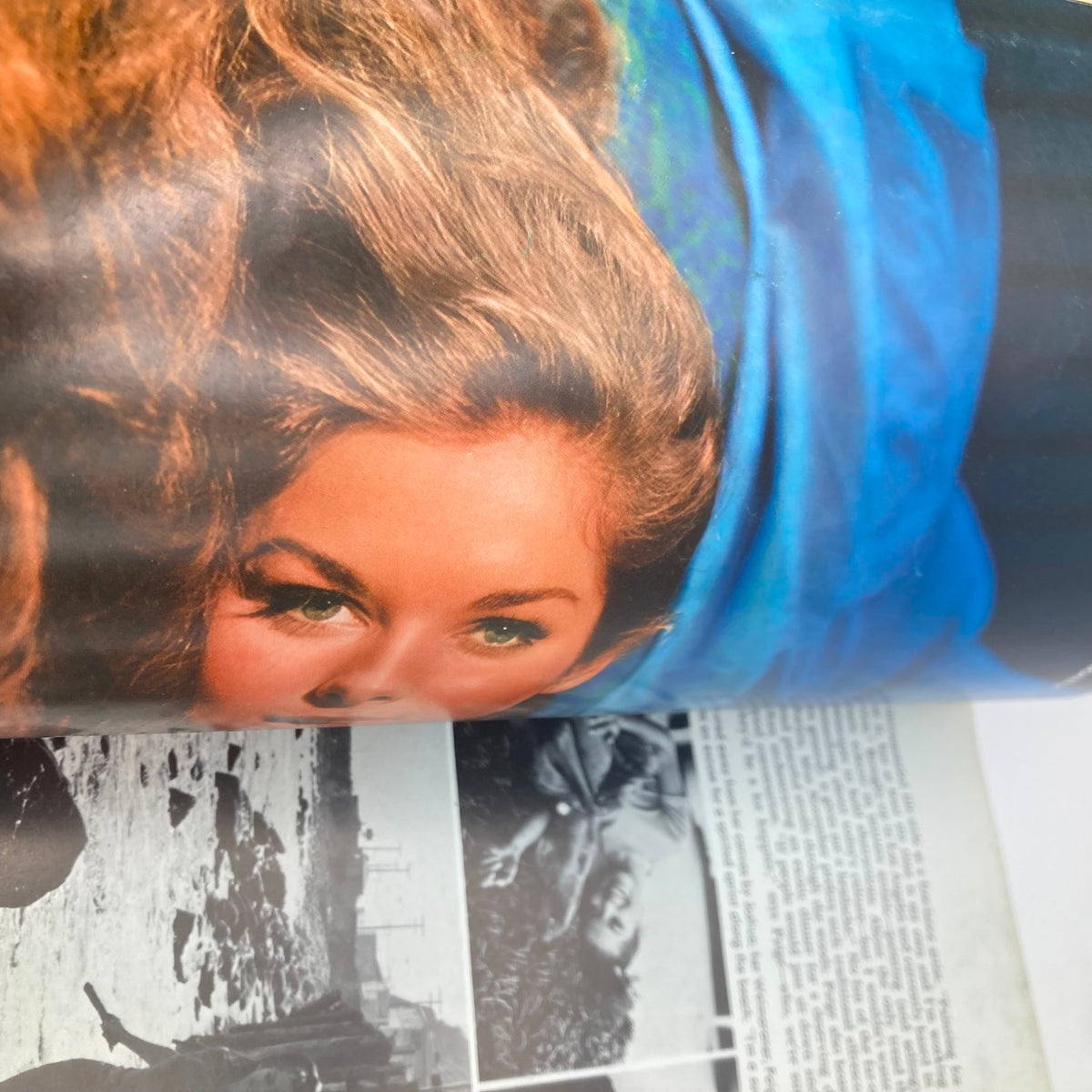 Interior page of the Vintage Playboy Magazine November 1968, highlighting a beautiful photo of a model with flowing hair, characteristic of the era's fashion.