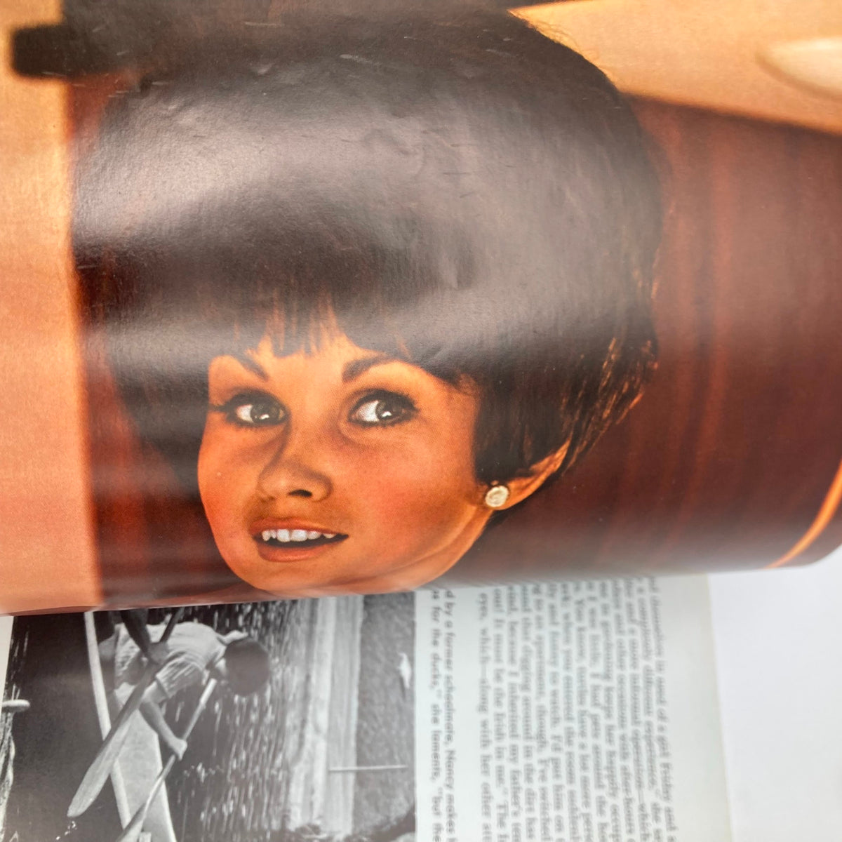 Interior page of VTG Playboy Magazine July 1969 featuring a close-up image of a young woman with an iconic 1960s hairstyle.