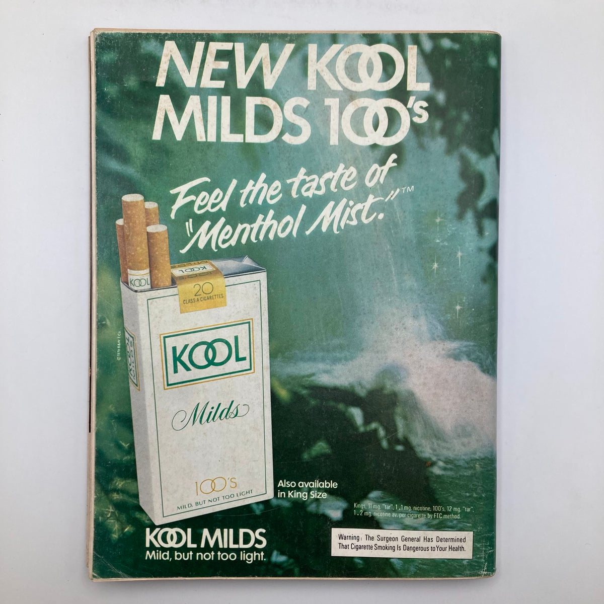 VTG Playboy Magazine January 1980 advertisement for Kool Milds 100's cigarettes, highlighting the packaging and taglines related to the cigarette brand, adding to the nostalgic charm of the vintage magazine.
