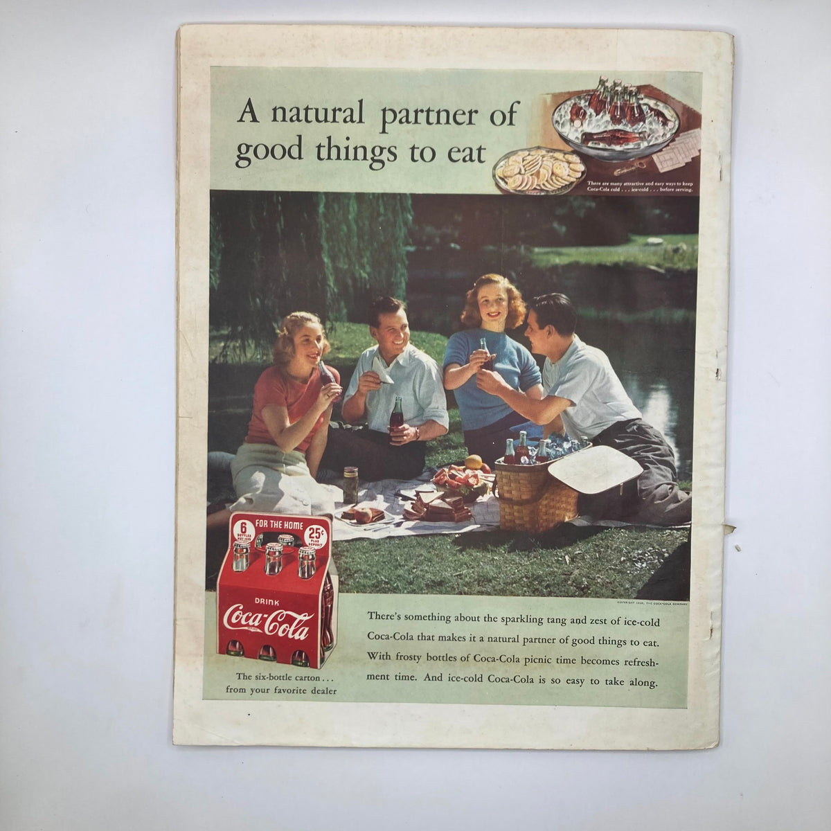 Back cover of VTG McCall's Magazine July 1939 featuring a nostalgic Coca-Cola advertisement with people enjoying a picnic.
