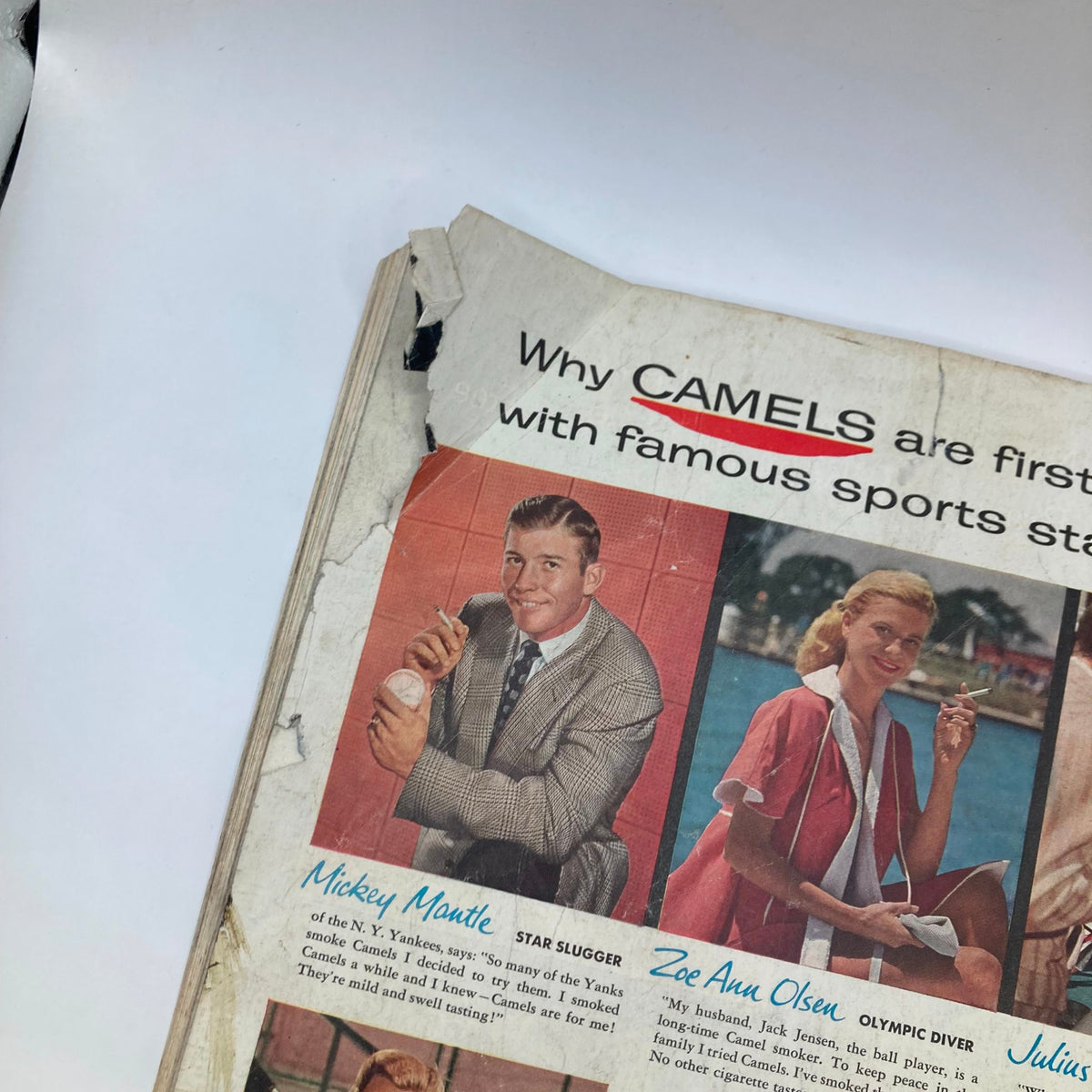 Close-up of a vintage advertisement from the Saturday Evening Post Magazine September 19, 1953, highlighting Mickey Mantle and Zoe Ann Olsen promoting Camels cigarettes with a nostalgic mid-century aesthetic.