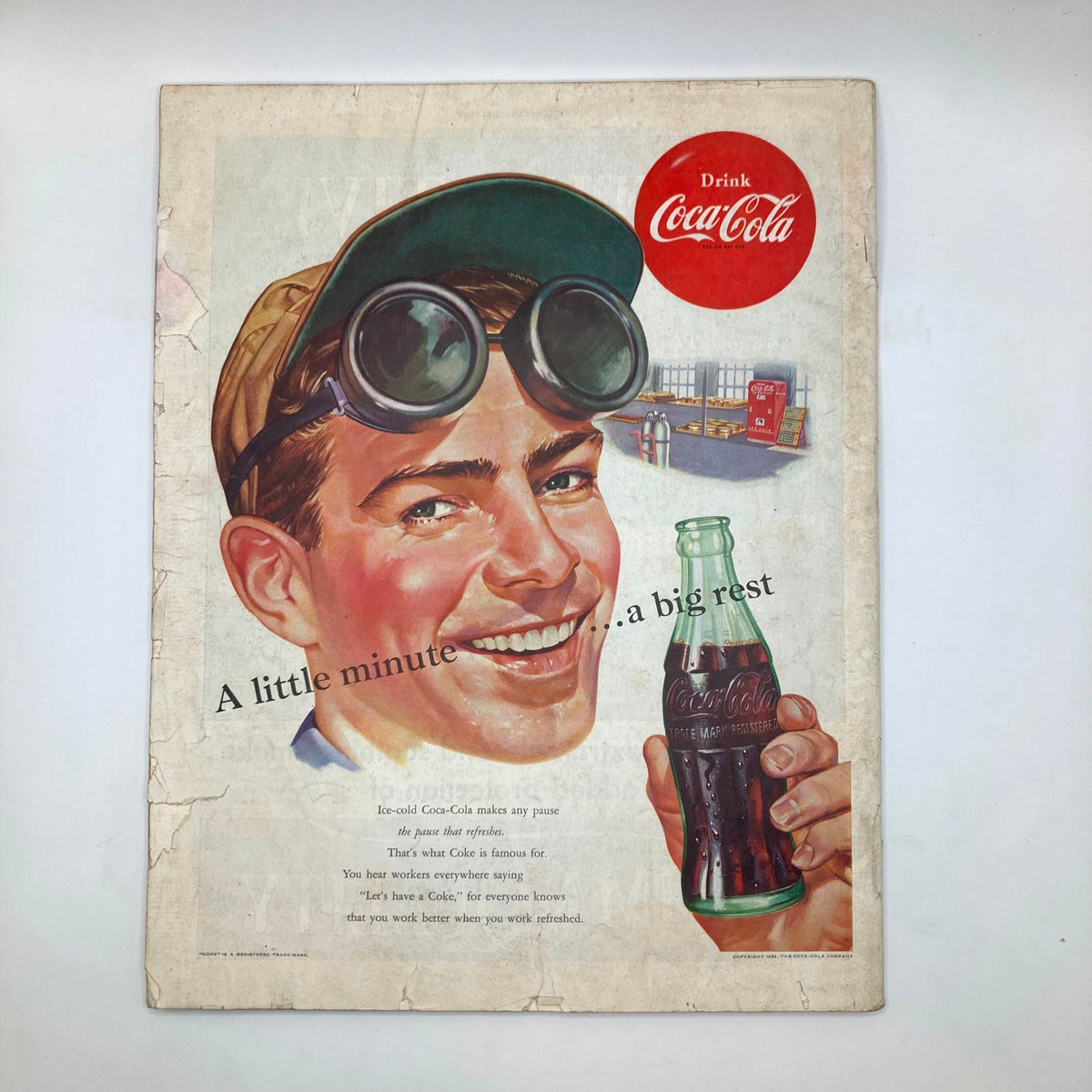 Cover of the Saturday Evening Post Magazine November 1, 1952, showcasing a vintage Coca-Cola advertisement with a smiling young man holding a Coke bottle, featuring retro artwork.