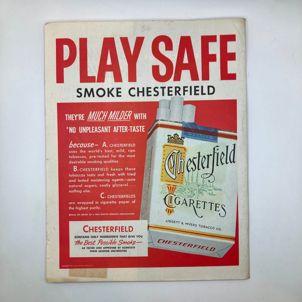 Advertisement page from Saturday Evening Post Magazine August 23, 1952 promoting Chesterfield cigarettes with a bold graphic design.