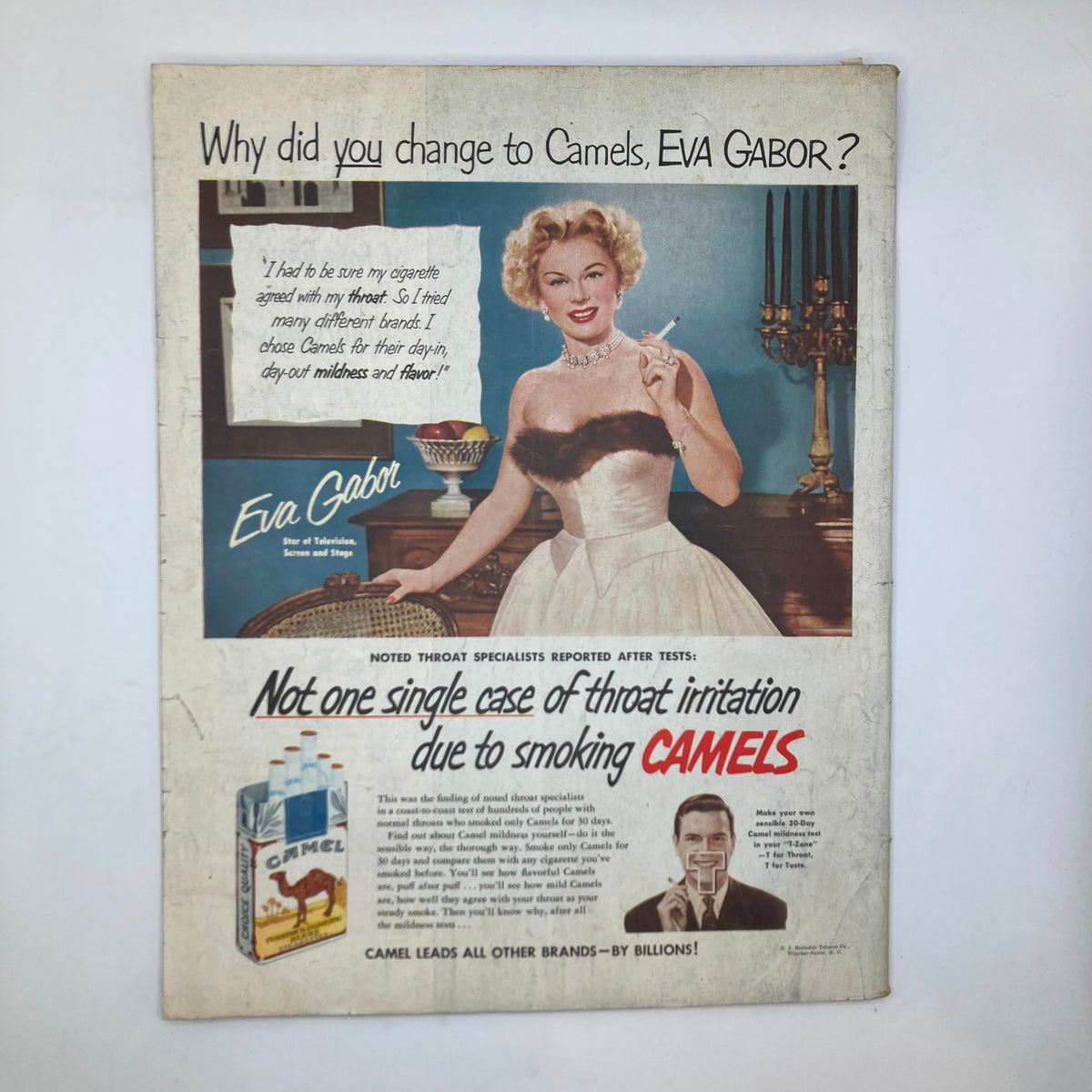 Vintage advertisement featuring Eva Gabor endorsing Camels cigarettes, with a prominent testimonial about the brand. This image is from a past issue of Saturday Evening Post Magazine February 9 1952, reflecting the advertising style of the time.