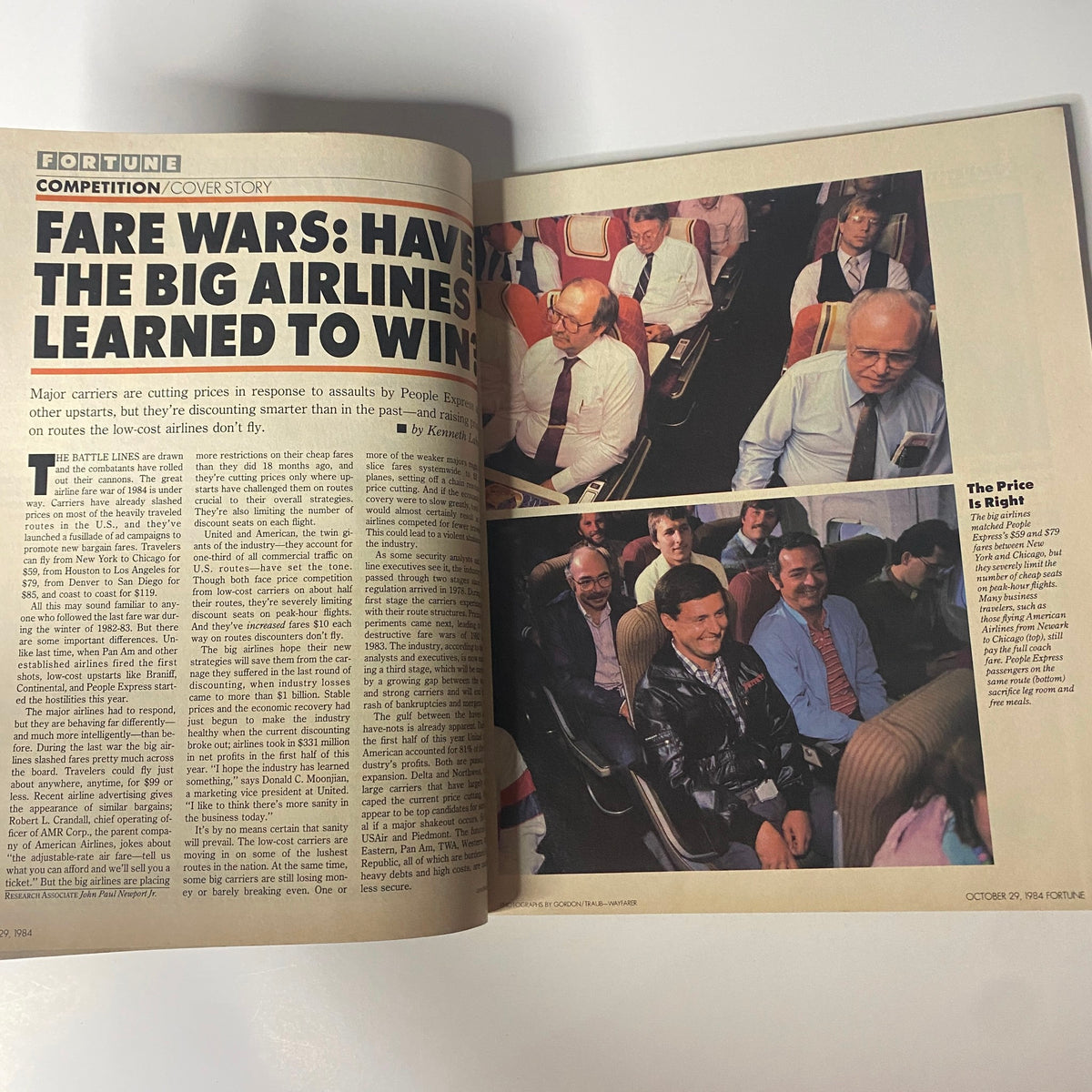 An article spread from Fortune Magazine October 29, 1984, titled 'Fare Wars: Have the Big Airlines Learned to Win?' showcasing images of passengers in airline seats, discussing competitive pricing in the airline industry.