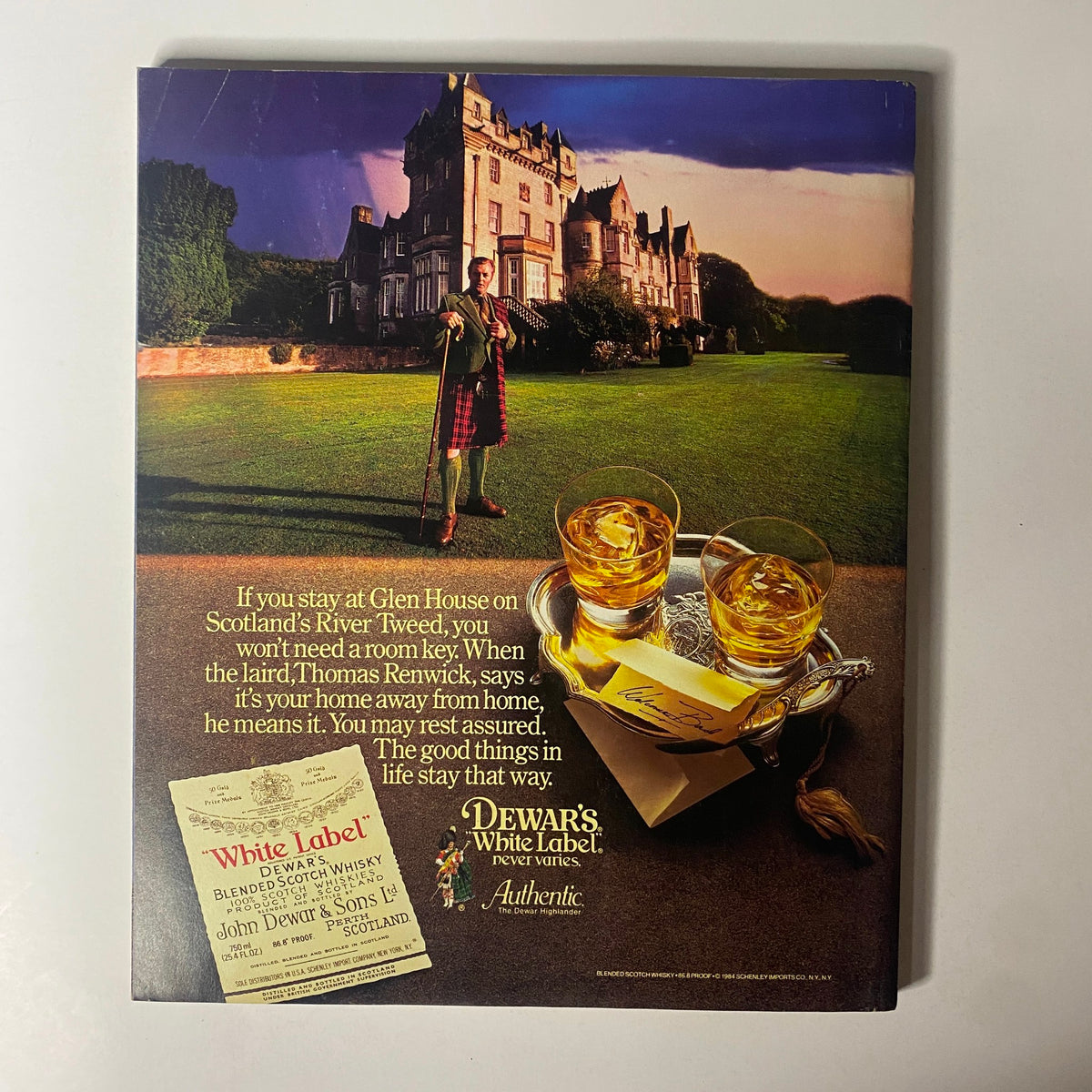 Back cover of Fortune Magazine October 15, 1984, featuring an advertisement for Dewar's White Label Scotch Whisky, evoking a sense of luxury and leisure.