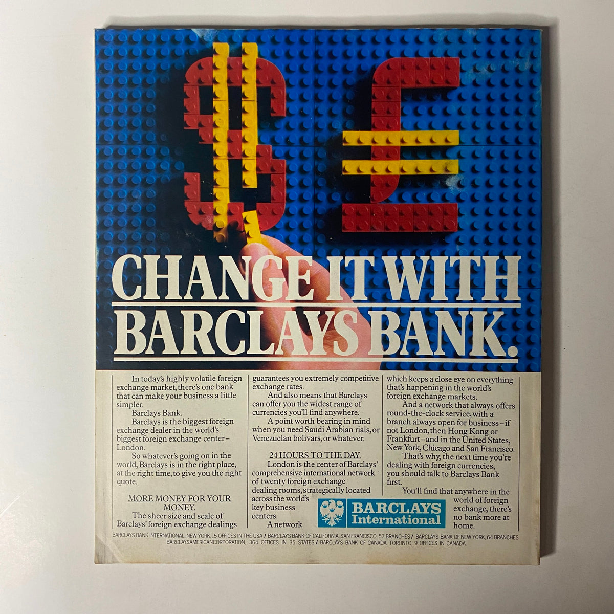 Fortune Magazine November 1, 1982 edition featuring an advertisement for Barclays Bank, showcasing foreign exchange services with colorful LEGO-style currency symbols in the background.