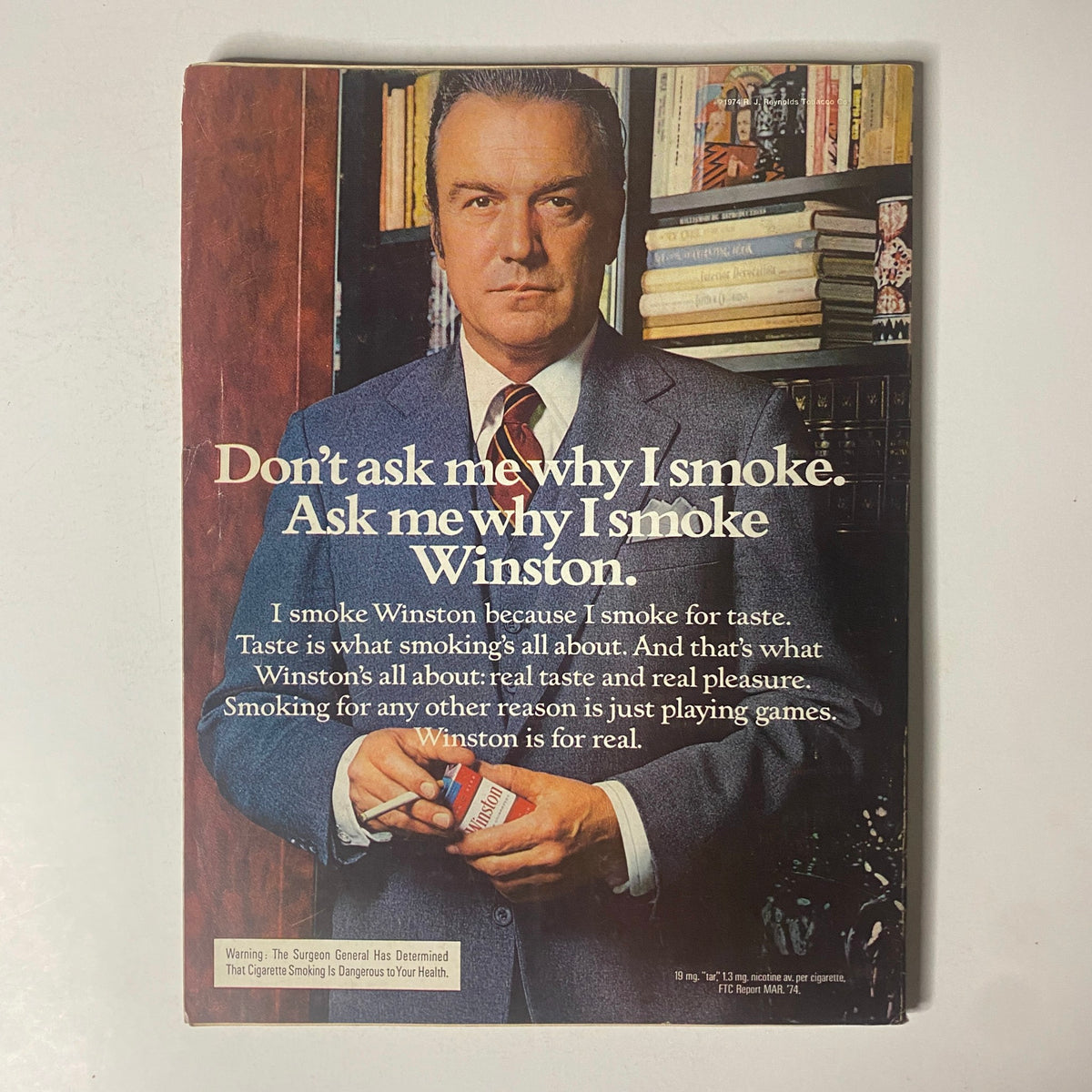 Cover of Esquire Magazine January 1975 featuring a cigarette advertisement with a man in a suit stating: 'Don't ask me why I smoke. Ask me why I smoke Winston.' This issue includes cultural insights from the 1970s.