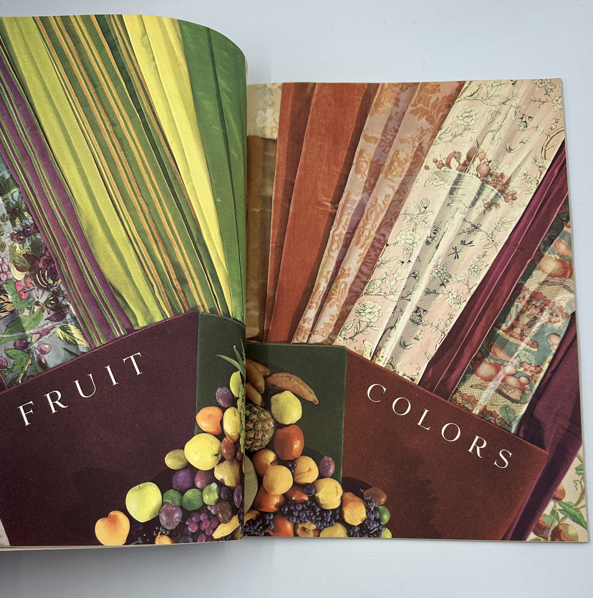 House Beautiful Magazine December 1938 featuring a colorful spread on fruits and fabrics with vibrant patterns.