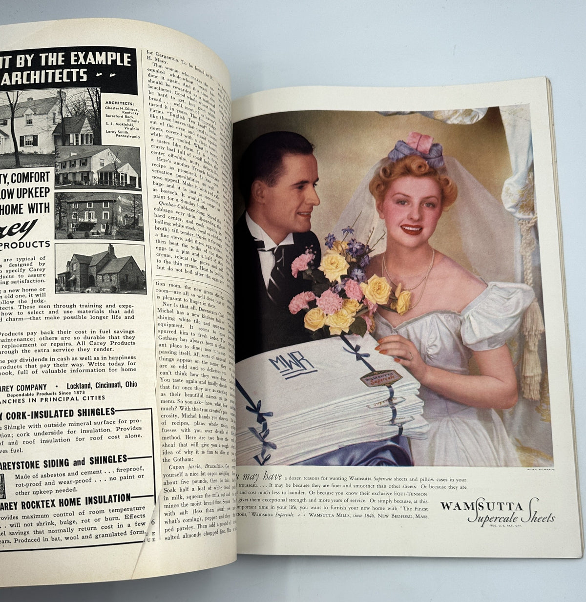 Interior spread of the March 1939 House Beautiful magazine showcasing an advertisement featuring a couple with flowers. Emphasizes the magazine's style and approach to home and garden.