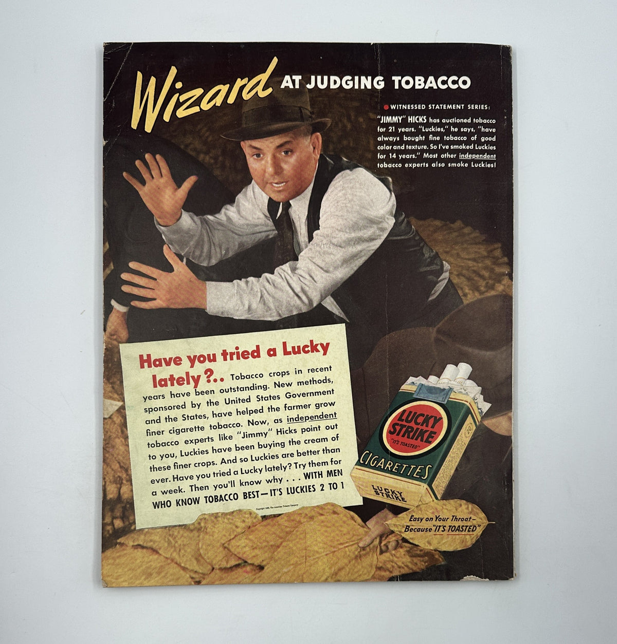 Vintage advertisement for Lucky Strike cigarettes featuring a magician, from House Beautiful Magazine March 1939 Small House Competition Building Design.