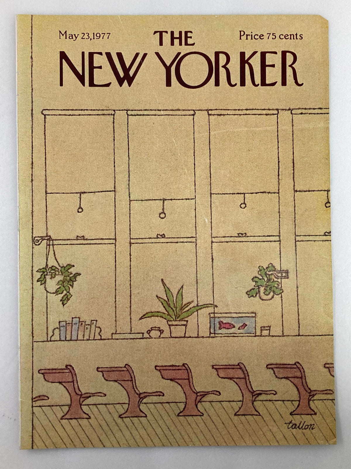 The New Yorker May 23 1977 Empty Desk cover featuring a minimalist design by Robert Tallon, showcasing an empty desk scene with potted plants and a bright, inviting atmosphere.