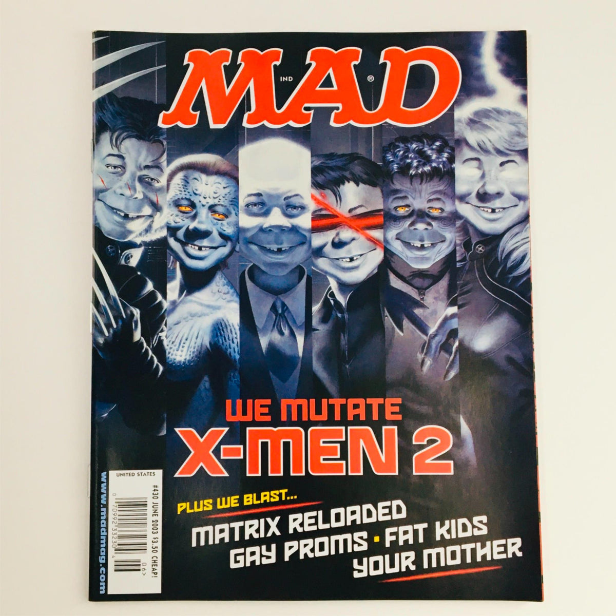 Cover of Mad Magazine June 2003 No. 430 featuring a satirical illustration related to X-Men 2, showcasing characters with humorous expressions, perfect for collectors and fans of vintage comic magazines.