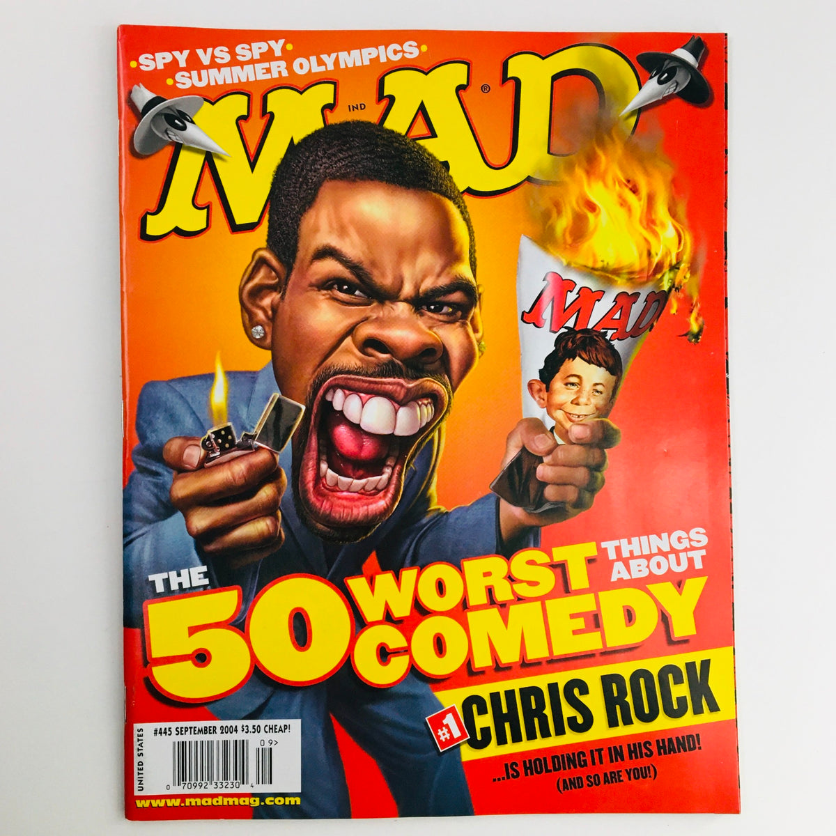 Mad Magazine September 2004 No. 445 cover featuring an illustration titled '50 Worst Things About Comedy' with Chris Rock as the central character, showcasing vibrant colors and comedic themes.