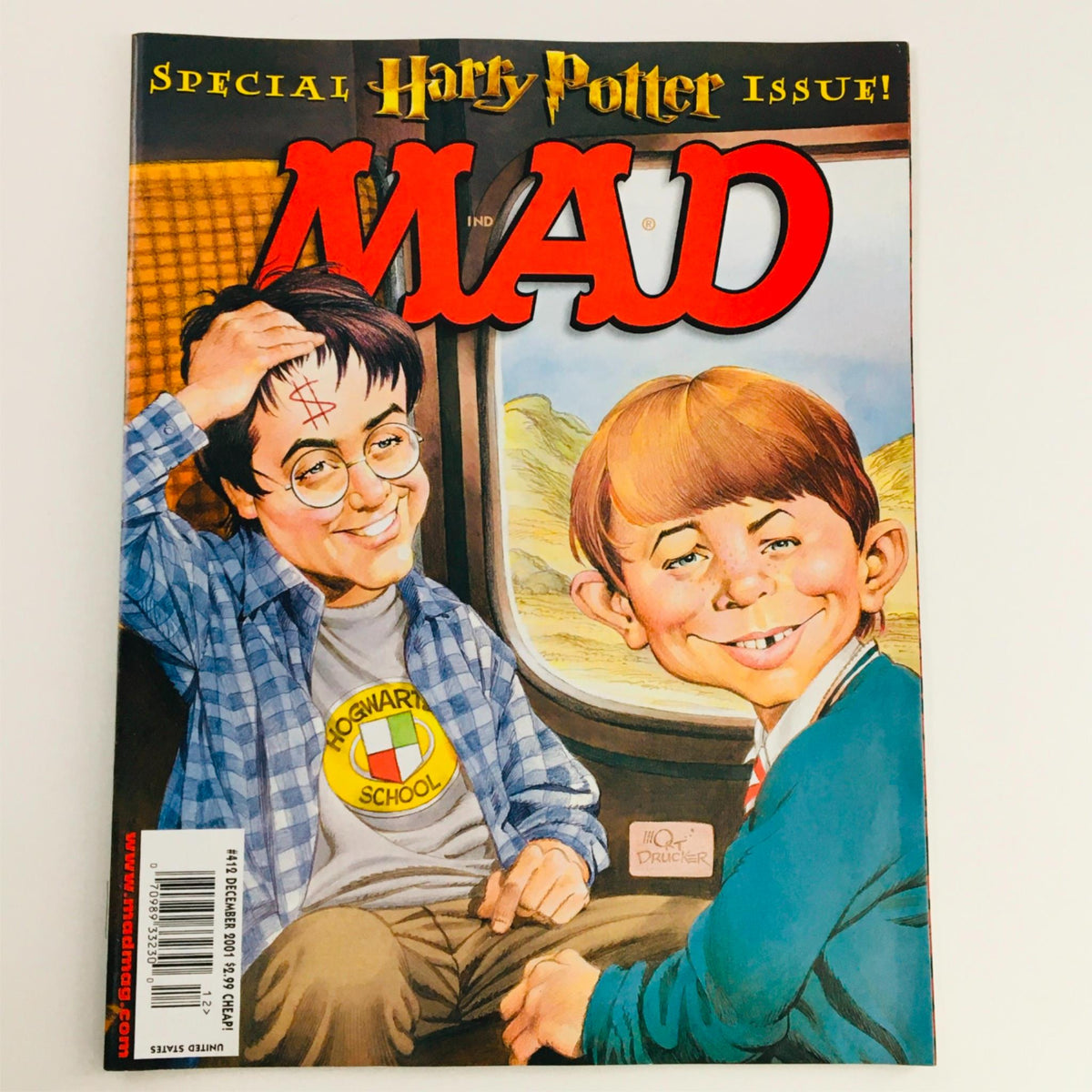 Mad Magazine December 2001 No. 412 Special Harry Potter Issue cover featuring caricatures of characters from the Harry Potter series, showcasing humor and satire.