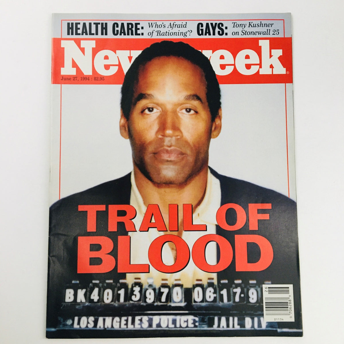 Newsweek Magazine cover from June 27, 1994 featuring O.J. Simpson with the title 'Trail of Blood' and a background of police booking information. The magazine emphasizes the controversial trial, aimed at collectors and those interested in historical events.