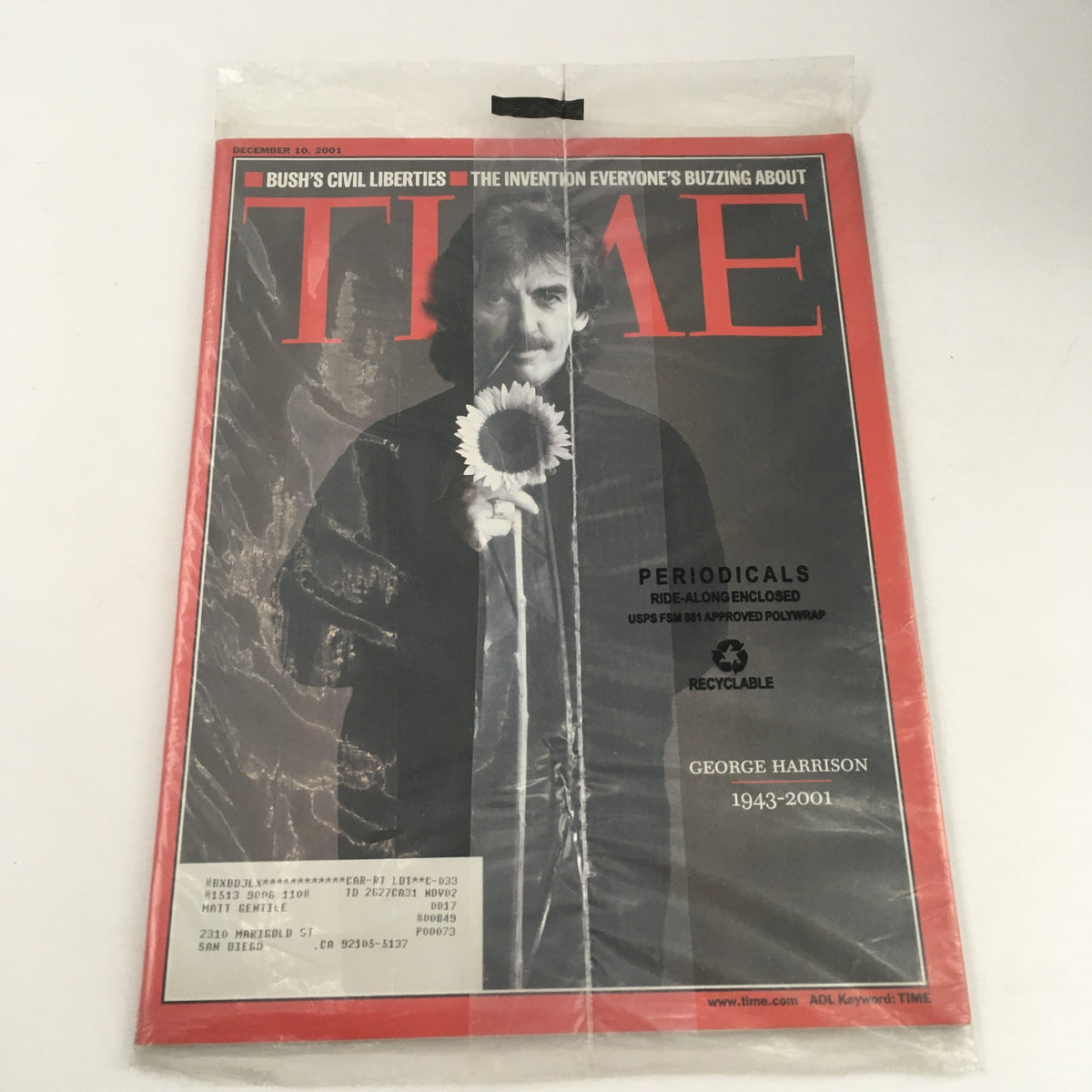 Time Magazine December 10, 2001 cover featuring George Harrison, showcasing a sunflower, highlighting his memoir 1943-2001, in sealed Very Good condition.