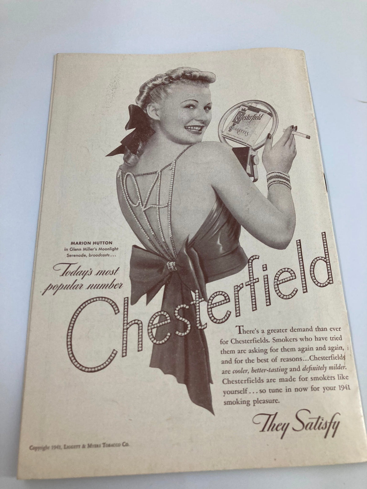 1940 The Town Hall Song Recital vintage magazine cover featuring Marion Hutton promoting Chesterfield cigarettes, showcasing 1940s fashion and advertising style.