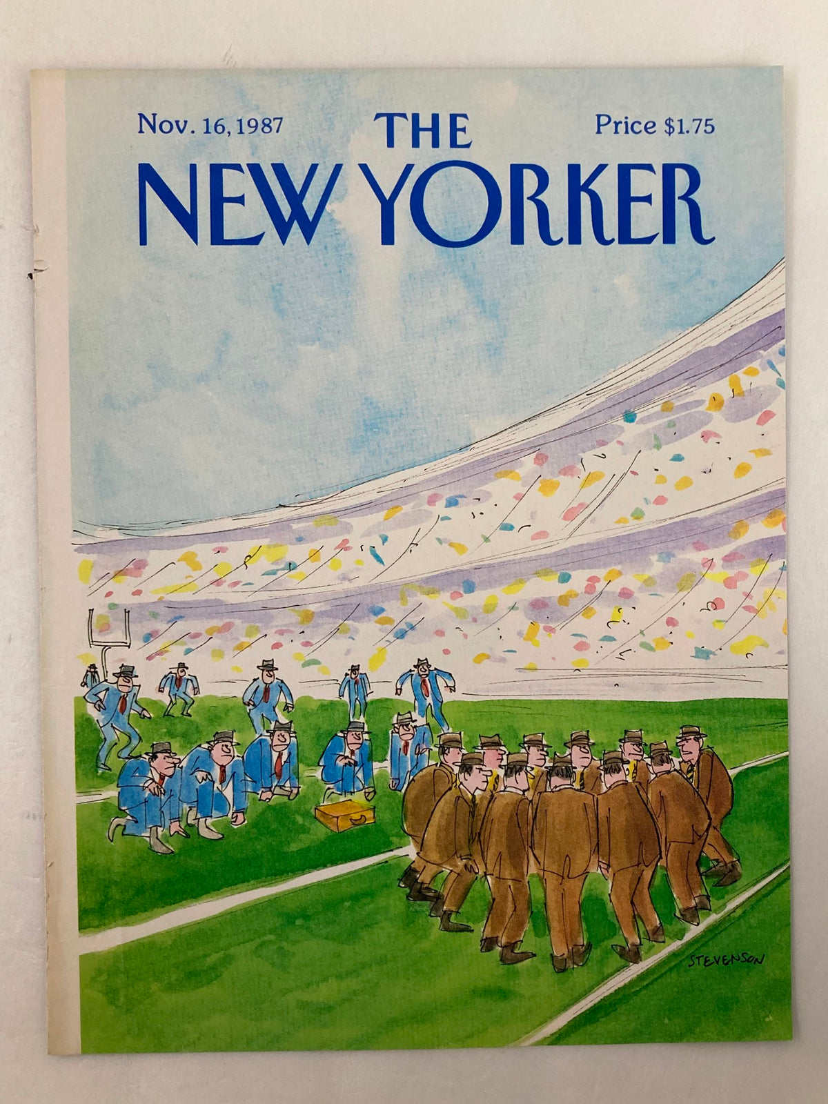 Cover of The New Yorker, November 16, 1987, titled 'Team Plan' by James Stevenson, showcasing a colorful depiction of a football game with men in suits and a festive stadium backdrop.