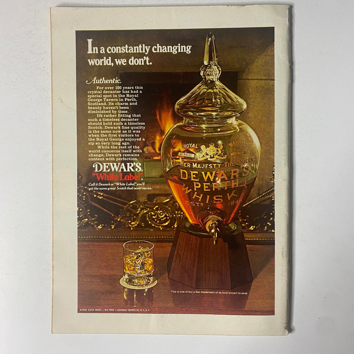 Dewar's White Label whiskey advertisement from The New Yorker full magazine, August 15, 1977, featuring a crystal decanter and glass of whiskey, showcasing the brand's heritage in a vintage style.