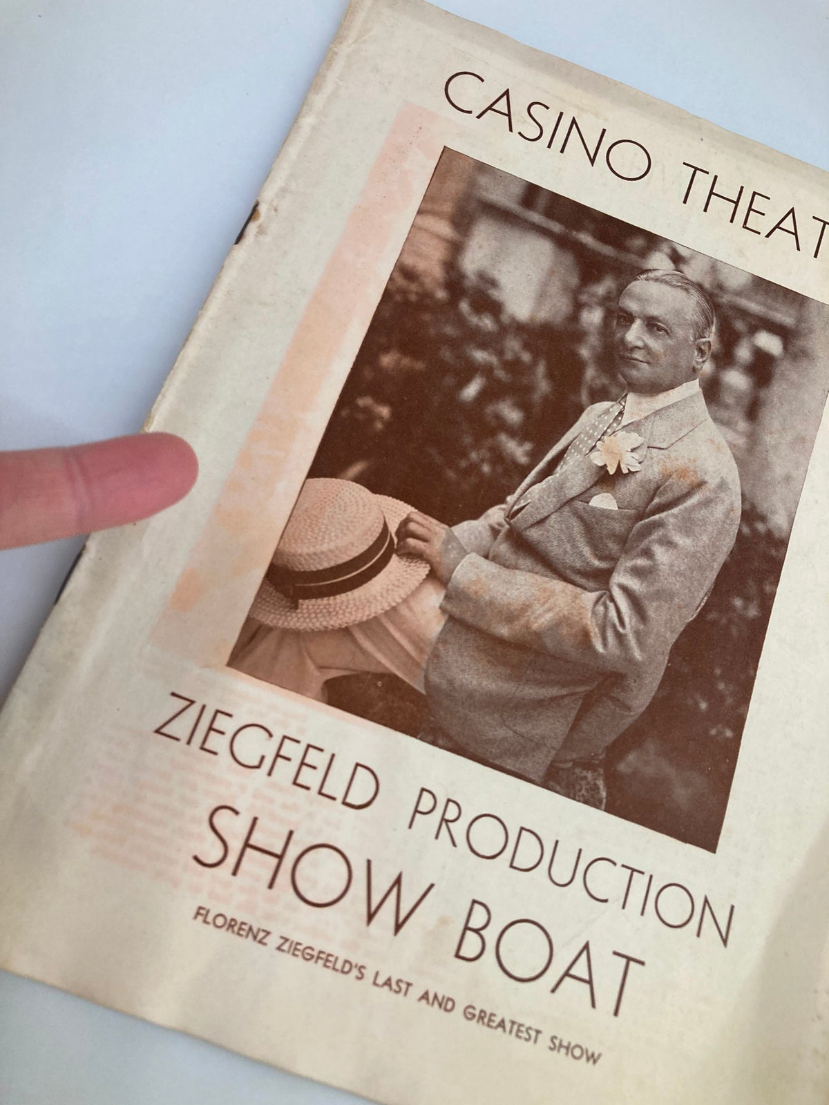 Close-up of the cover of the 1940 Casino Theatre Ziegfeld Production of Show Boat, highlighting the title and photograph of a stylish gentleman, celebrating the legacy of live performance.