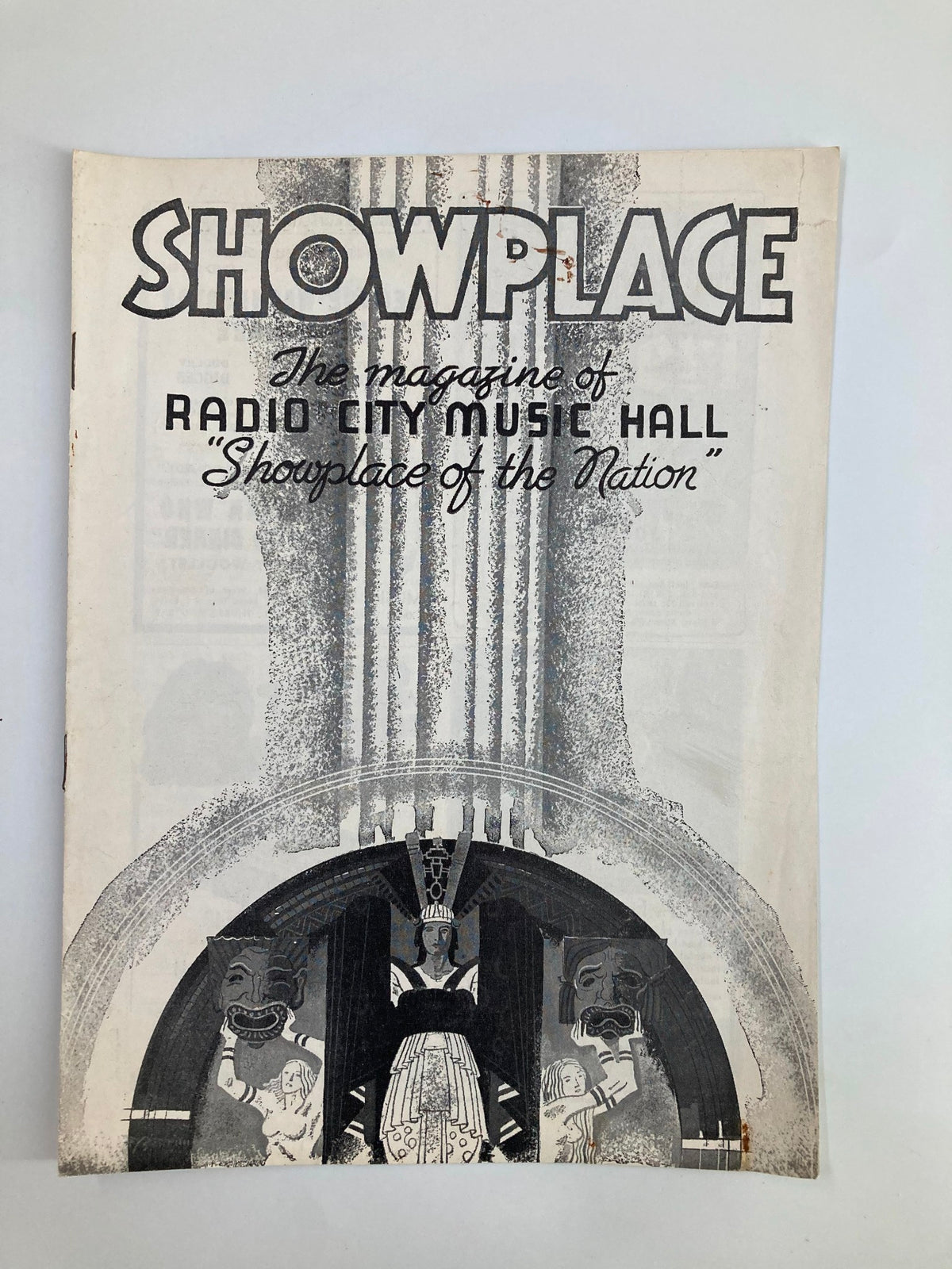 Cover of the playbill 'Showplace' for Radio City Music Hall featuring the title 'The Thief of Bagdad' directed by Ludwig Berger, showcasing vintage illustrations and design from 1940.