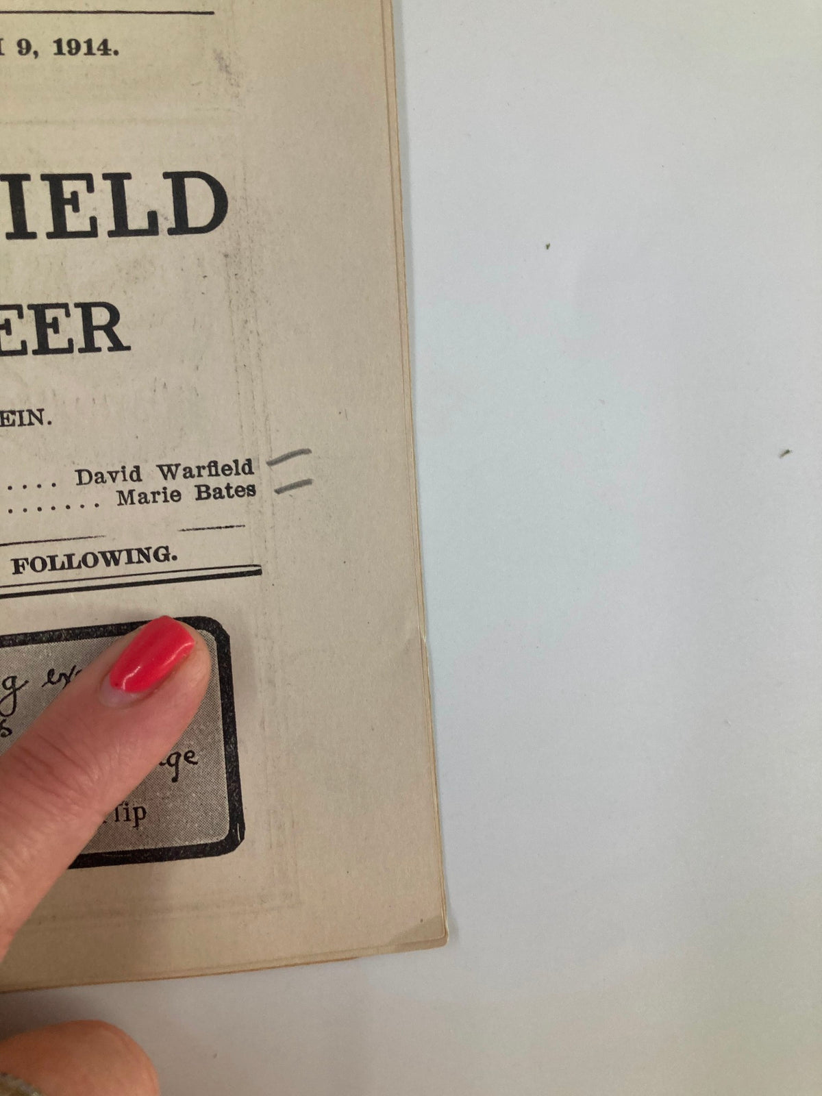 Detail view of the 1914 The Montauk Theatre David Warfield in The Auctioneer playbill - Highlighting the cast names and the historical significance of the theatrical production.