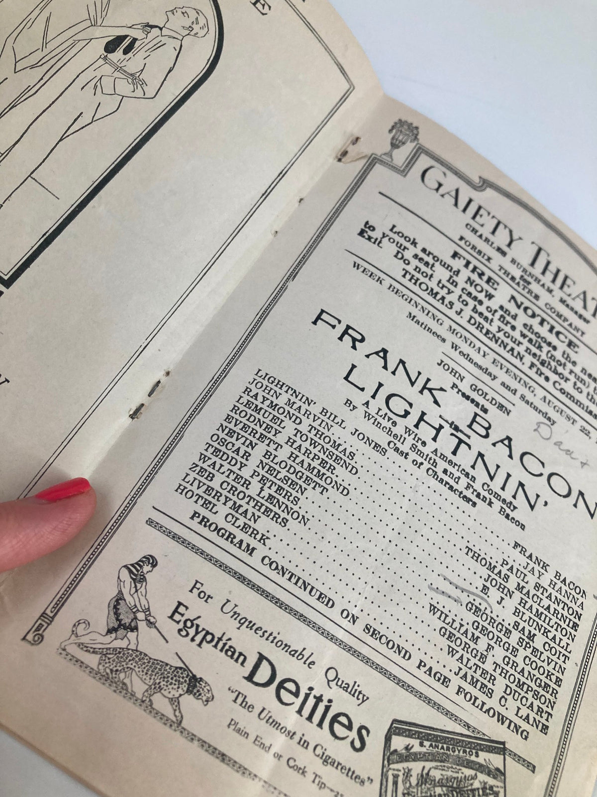 Interior view of the 1921 Gaiety Theatre Playbill featuring Frank Bacon in Lightnin', showcasing the cast and crew details alongside a vintage advertisement.