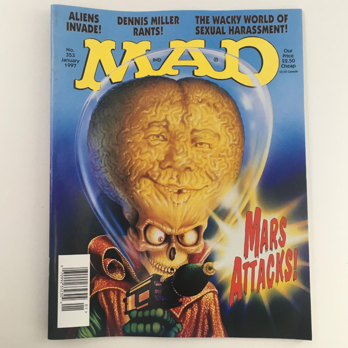Mad Magazine January 1997 No. 353 cover featuring Mars Attacks! art, showcasing a humorous alien character with a skull and an exaggerated brain, emphasizing the magazine's satire and pop culture commentary.