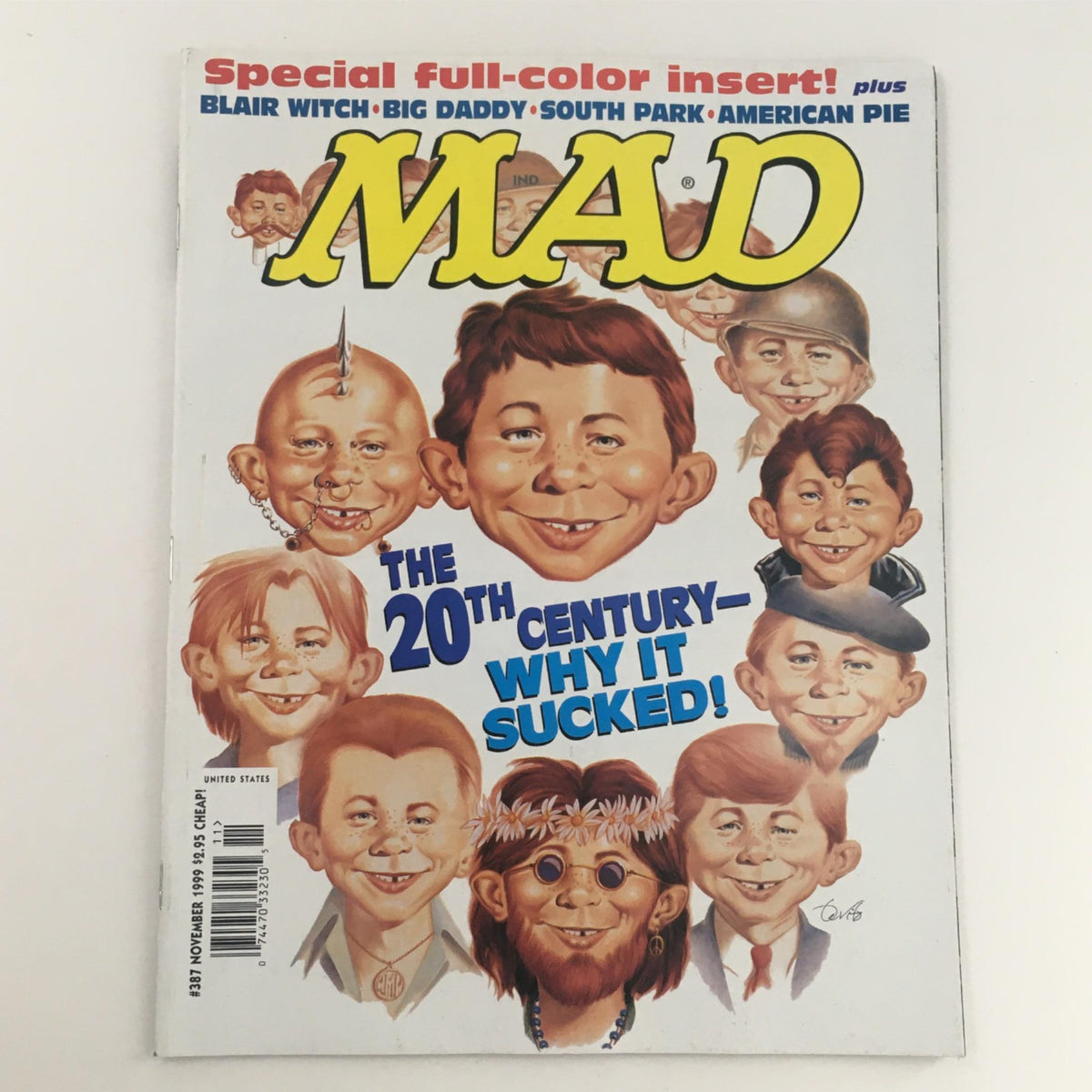 Cover of Mad Magazine November 1999 No. 387 titled 'The 20th Century - It Sucked'. Features cartoonish characters with humorous expressions and the iconic MAD logo.