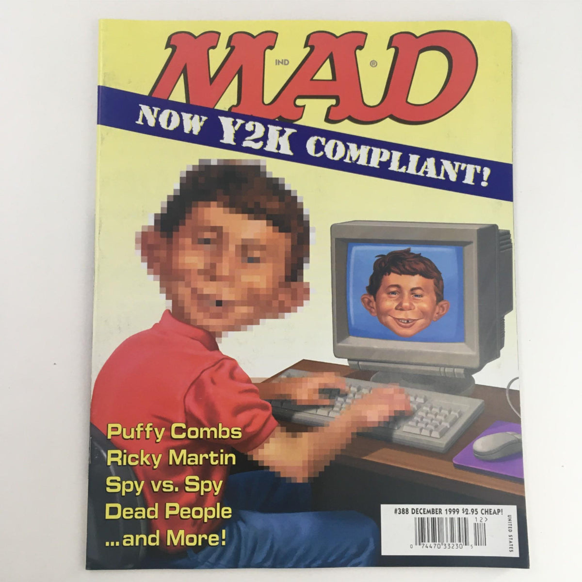 Cover of Mad Magazine December 1999 No. 388 featuring a humorous illustration with the text 'Now Y2K Compliant', showcasing a character at a computer with pop culture references.