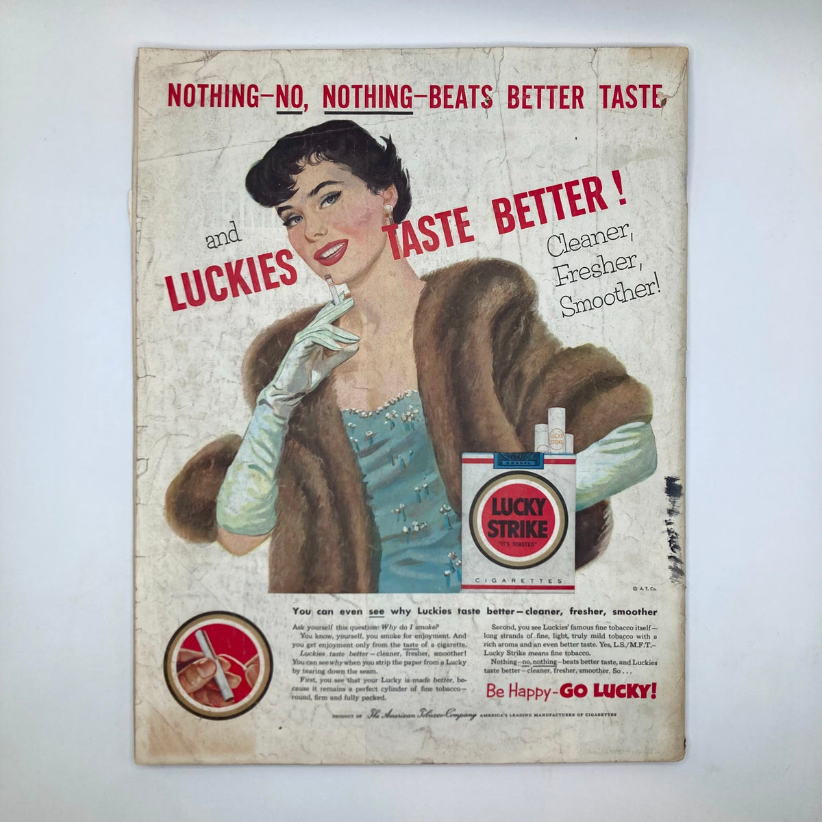 Vintage advertisement for Lucky Strike cigarettes featuring a glamorous woman in a fur coat and blue dress, highlighted in the Saturday Evening Post Magazine from March 7, 1953, showcasing 1950s culture.
