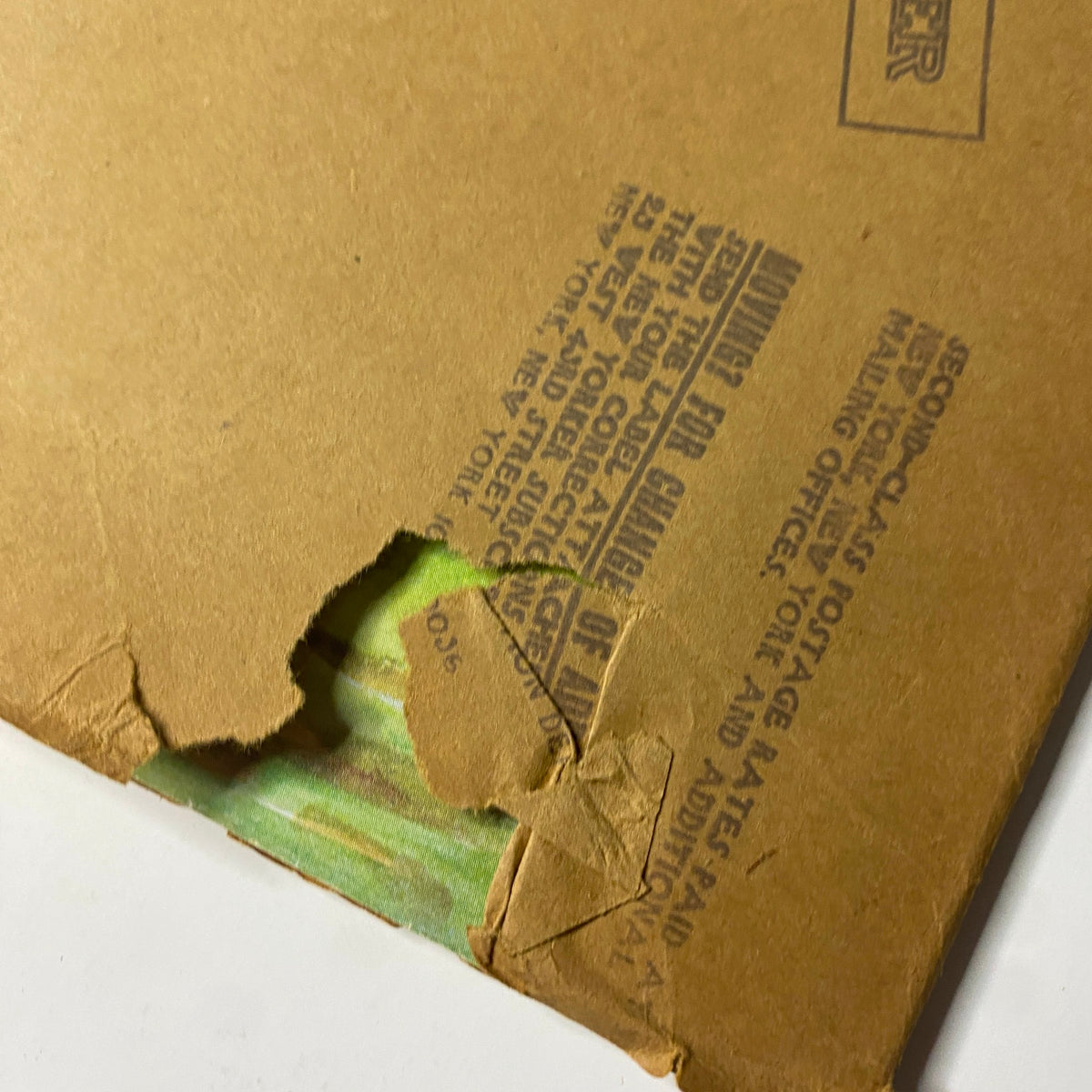 Detail of the back cover of The New Yorker magazine July 19, 1976, with visible damage and publication information.