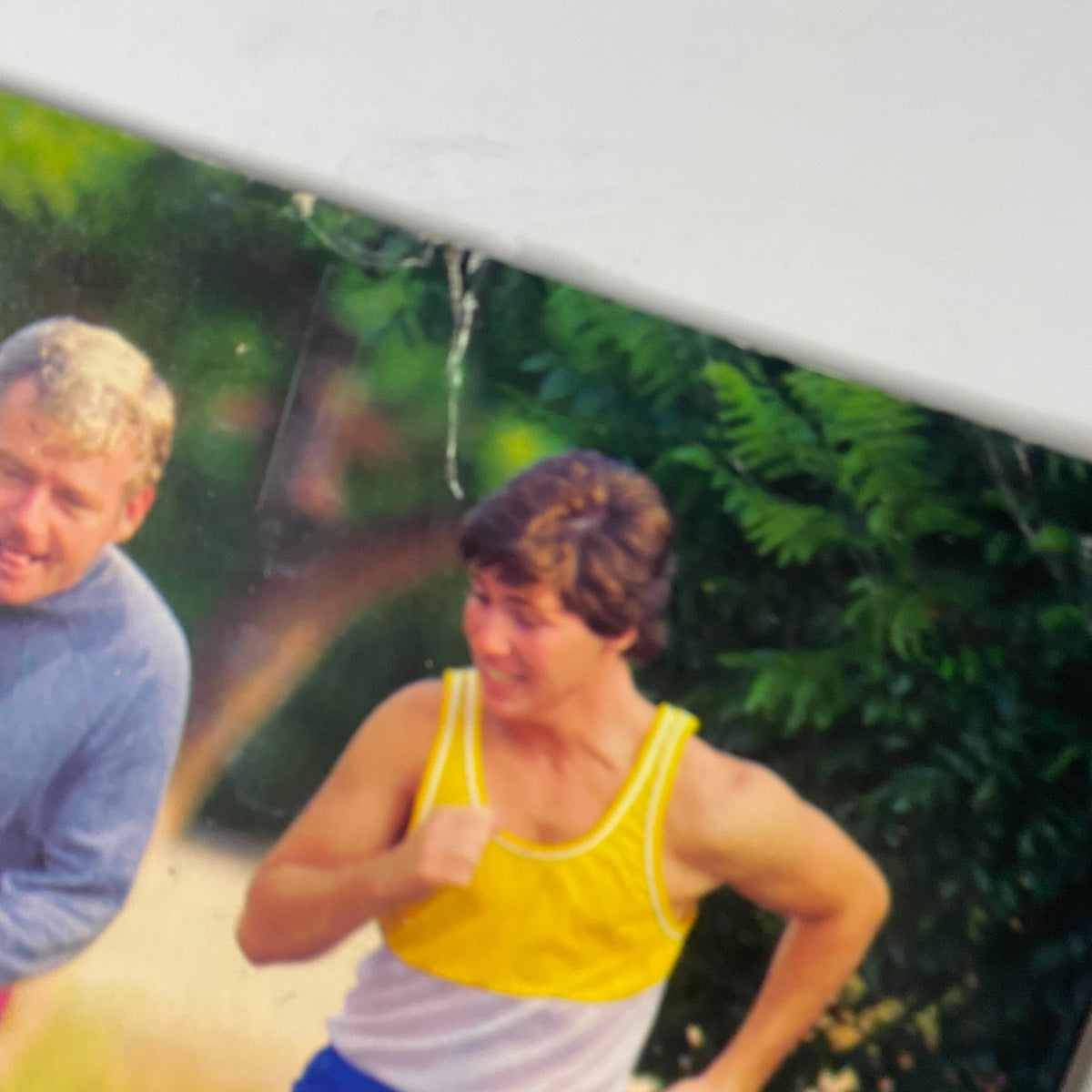 Close-up of the back cover of Fortune Magazine February 6, 1984, showing two men jogging, advertising CNA insurance.