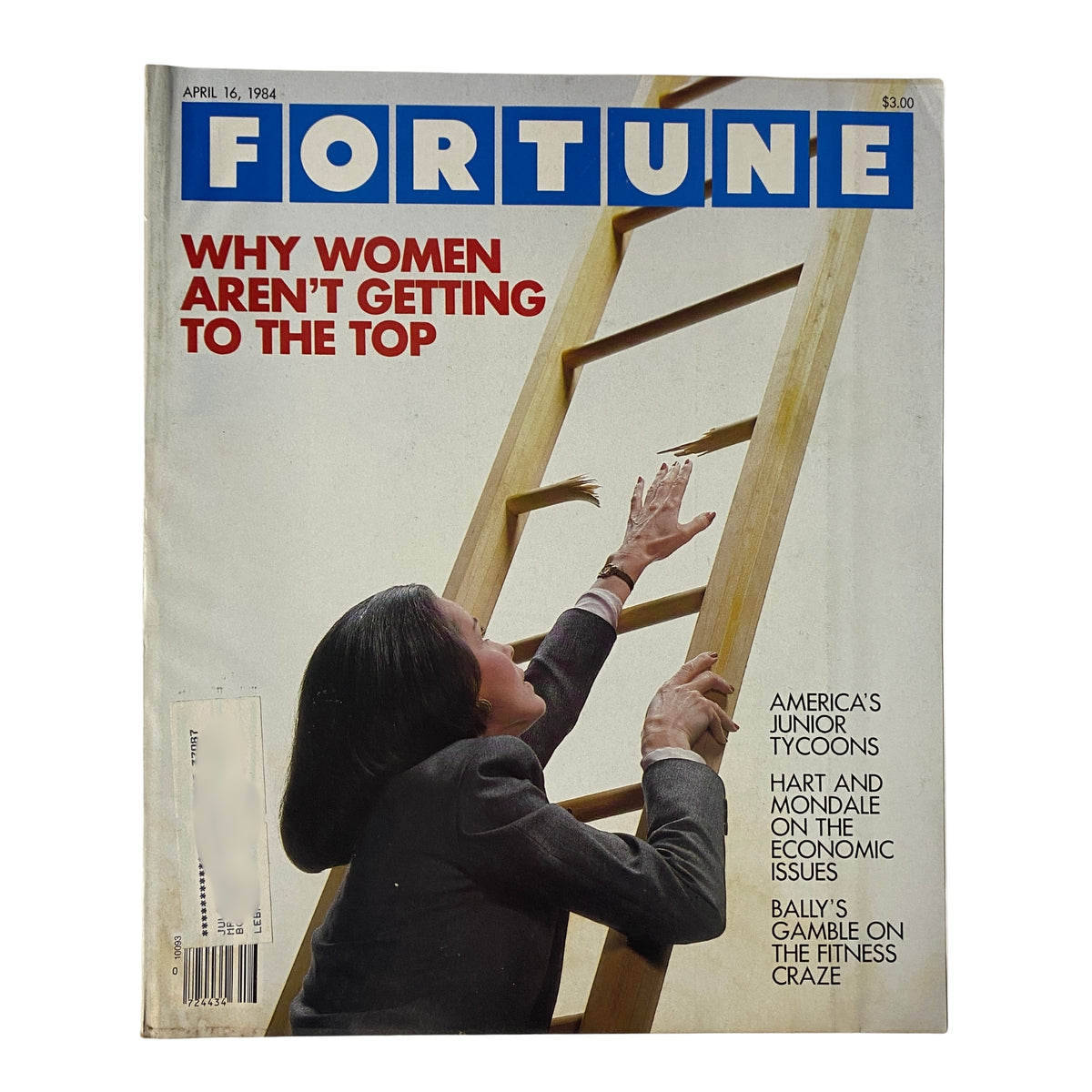 Fortune Magazine April 16, 1984 cover featuring the title 'Why Women Aren't Getting to the Top', showcasing a woman reaching for a ladder symbolizing corporate advancement.
