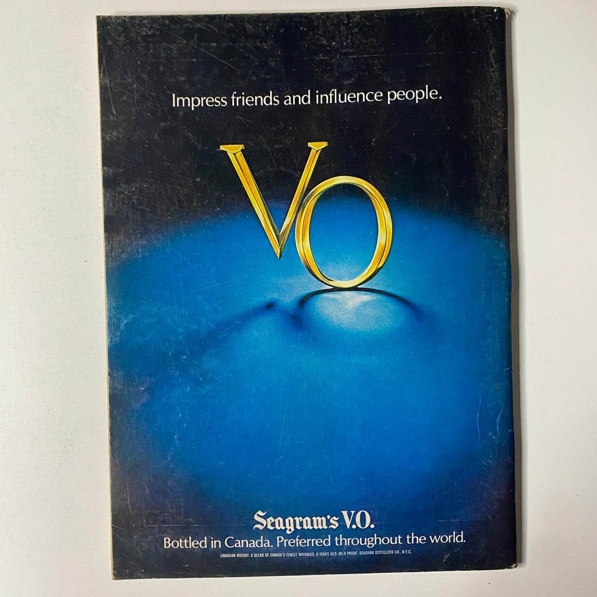 Vintage Seagram's V.O. advertisement featured in The New Yorker Full Magazine March 20, 1978, showcasing a stylish logo with the tagline 'Impress friends and influence people'.