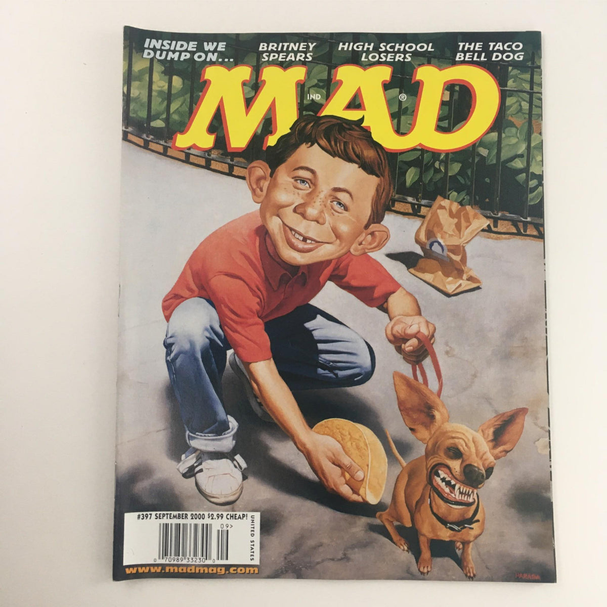 Mad Magazine September 2000 No. 397 cover featuring the Taco Bell Dog and humorous caricature of a boy. Very Fine condition VF 8.0.