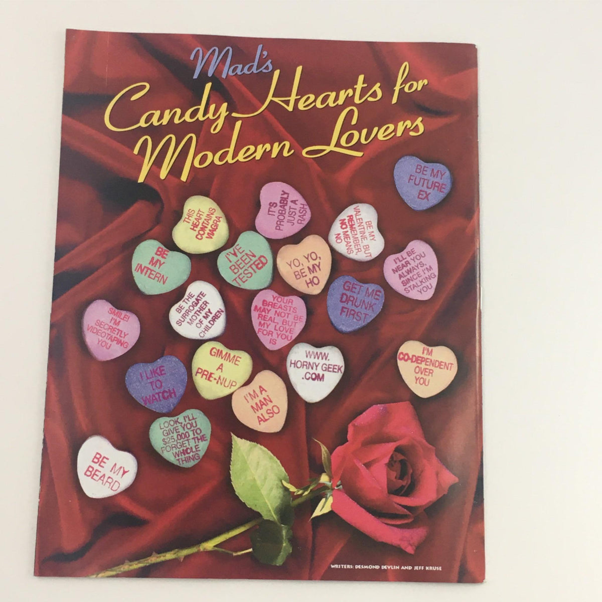Mad Magazine February 1999 Issue No. 378 showcasing a playful take on candy hearts with humorous phrases for modern lovers, alongside a rose.